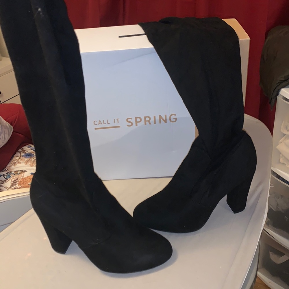 Knee high heeled boots